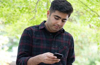 man holding cell phone